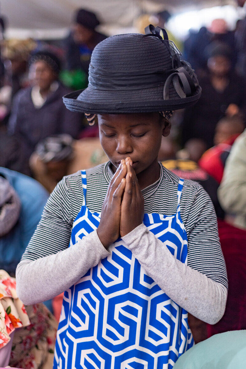 Woman in fervent prayer