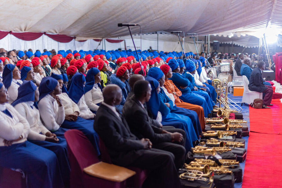 Choir seated with instruments