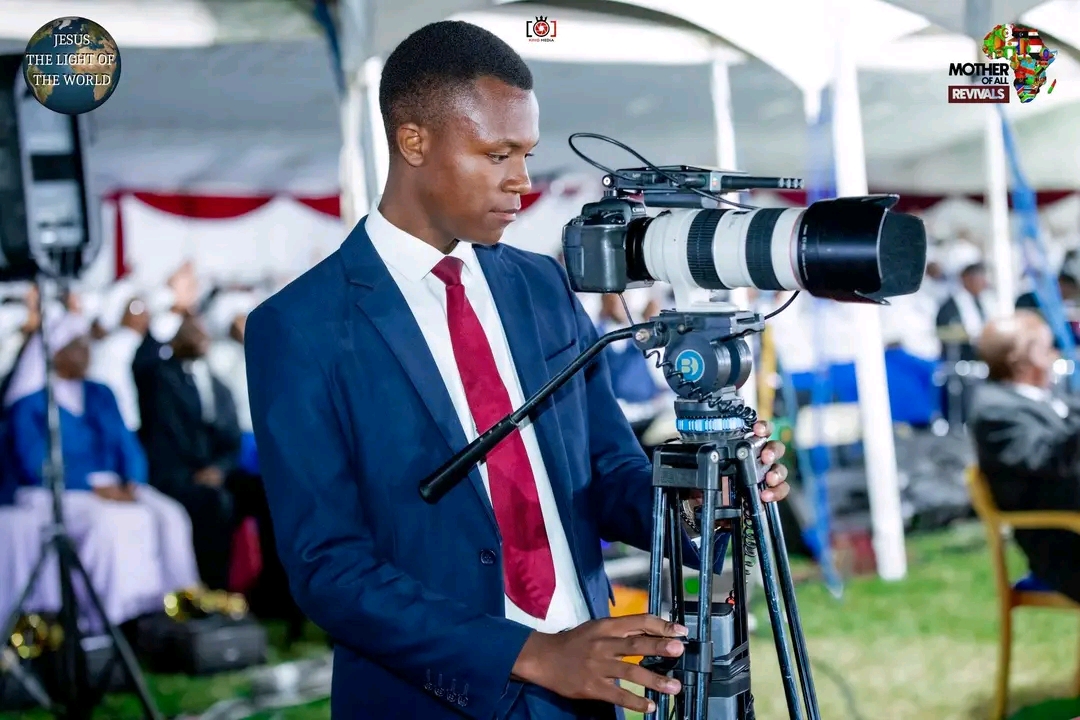 Mother Of All Revivals — cameraman on a tripod