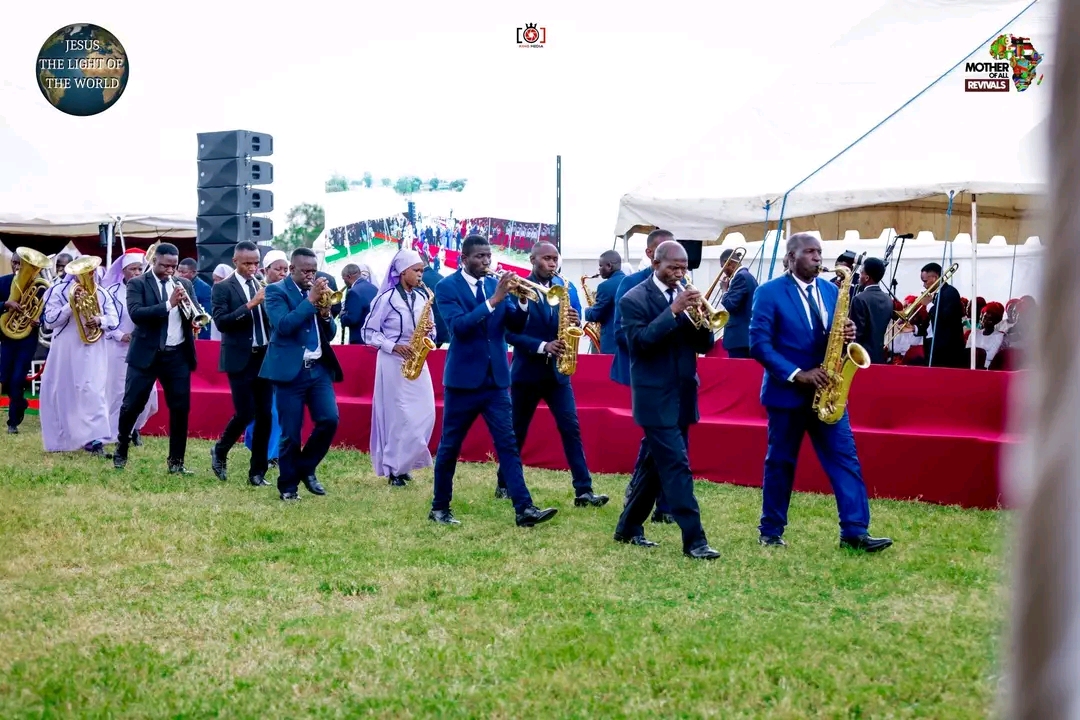 Mother Of All Revivals — brass band marching on the grounds