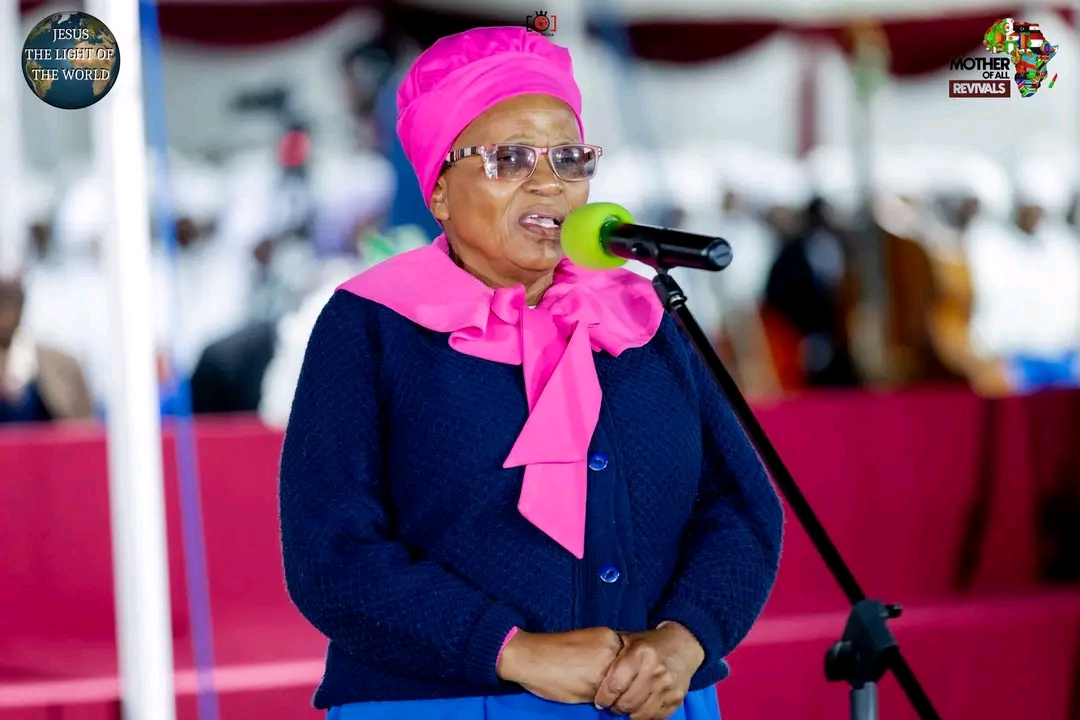 Mother Of All Revivals — minister leading worship at the mic